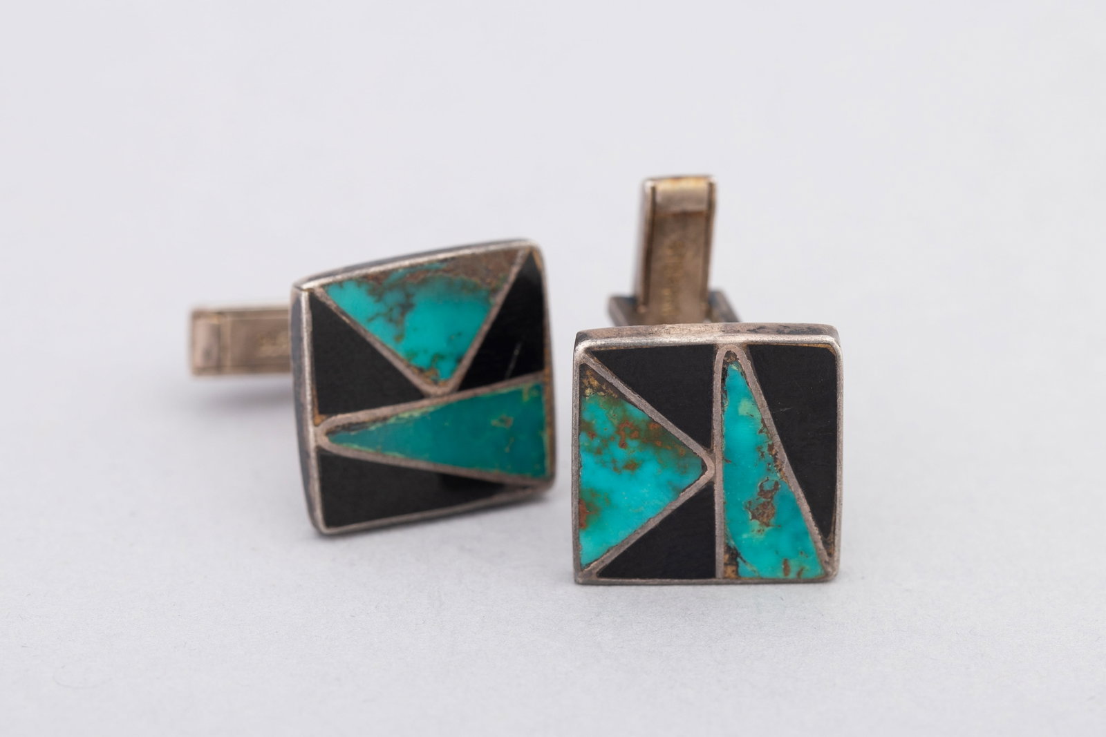Zuni Inlaid Post Cuff Links, Turquoise & Jet, Ca. 1950s: Pair of Zuni Inlaid Post Cuff Links, Turquoise & Jet, Ca. 1950s; Measurements: 5/8" x 5/8"; Pair Weight: 10 grams