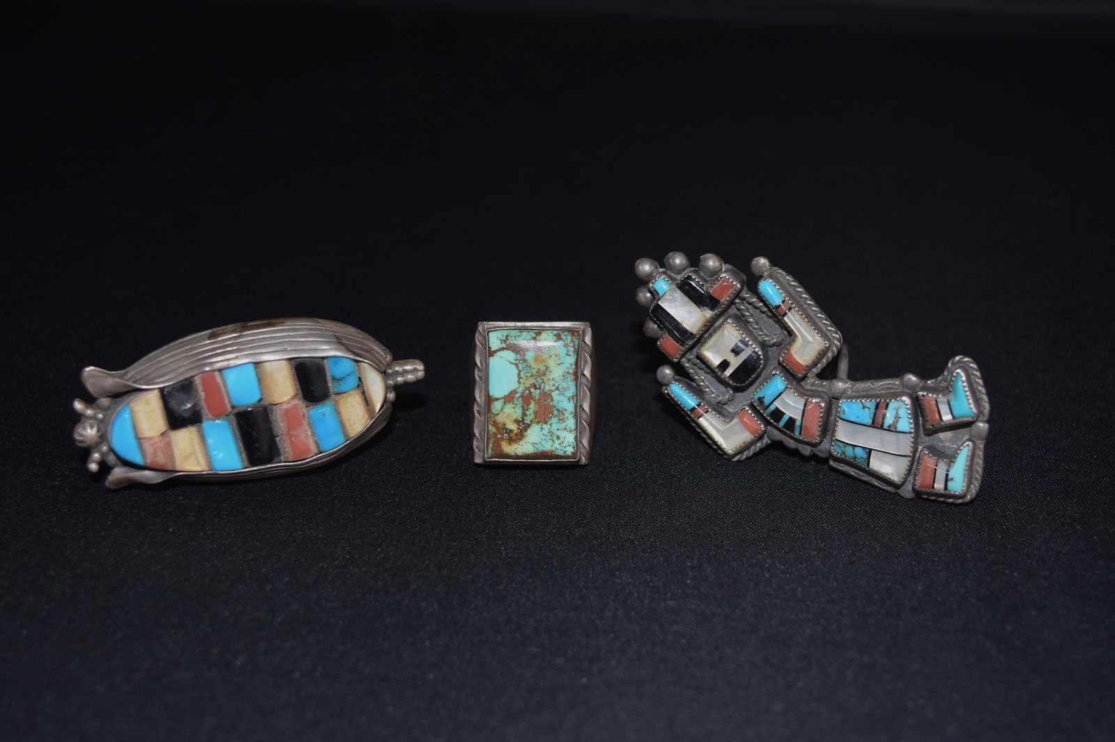 Lot of 3 Rings: 1) Zuni Inlay Rainbow Man Ring, 2) Corn Ring Marked "ML", 3) Navajo Silver &: 1) Size 7 1/4", 1 1/4 x 2 3/4", 24 grams; 2) Size 8 3/4, 2 1/2 x 1 1/8", 27 grams, 3) Size 10, 1 x1", 31 grams