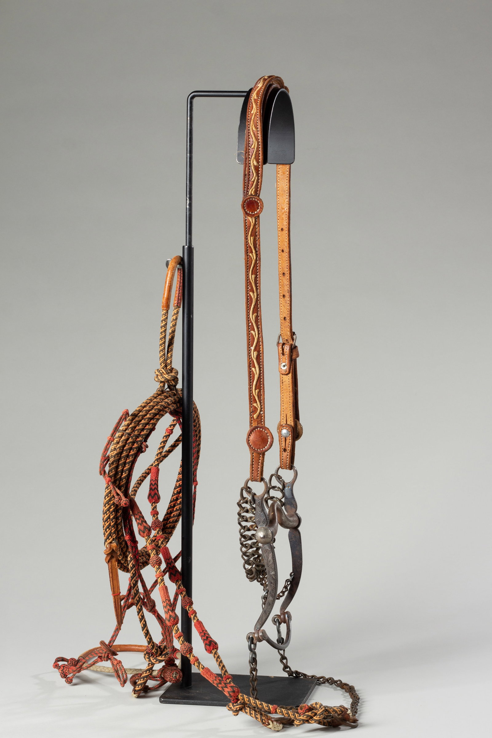Mexican Bridle and Bit: Vintage leather bridle with piteado vine design, Mexican bit and Charro style reins.