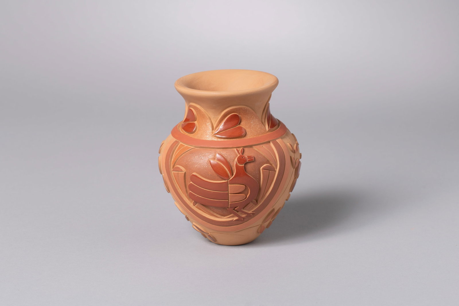 Santa Clara Jar, Tammy Garcia (b. 1969): Santa Clara Jar, Tammy Garcia (b. 1969) Her designs tell stories of Pueblo life with insects and animals, carved both traditionally and stylized contemporary. She has earned multiple awards for her po