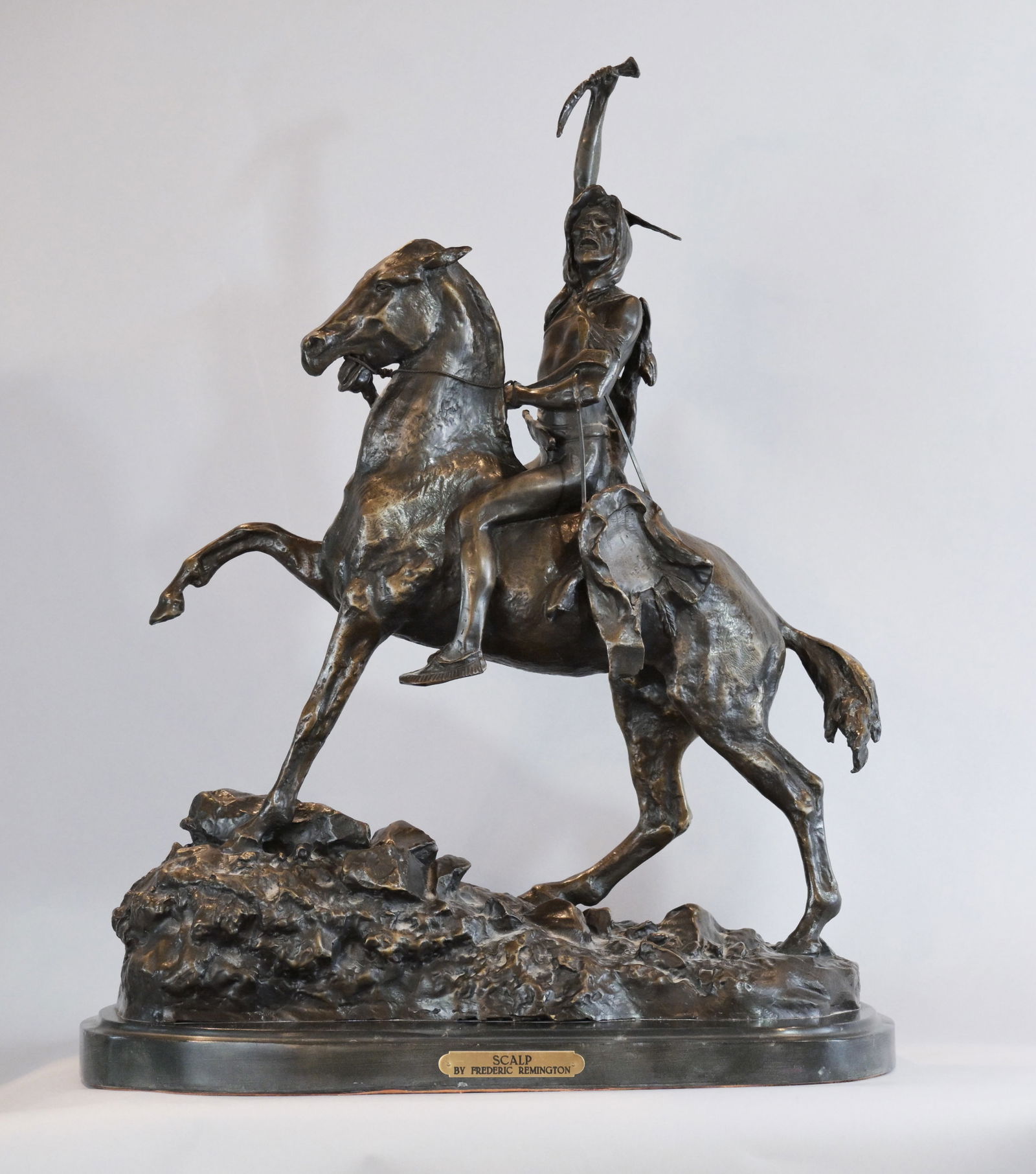 Fredric S Remington "The Scalp" Bronze: Frederic S Remington (1861-1909) Frederic Remington became the foremost turn-of -the-century illustrator, painter, and sculptor of western action-packed subjects with cowboys, Indians, horses, soldier