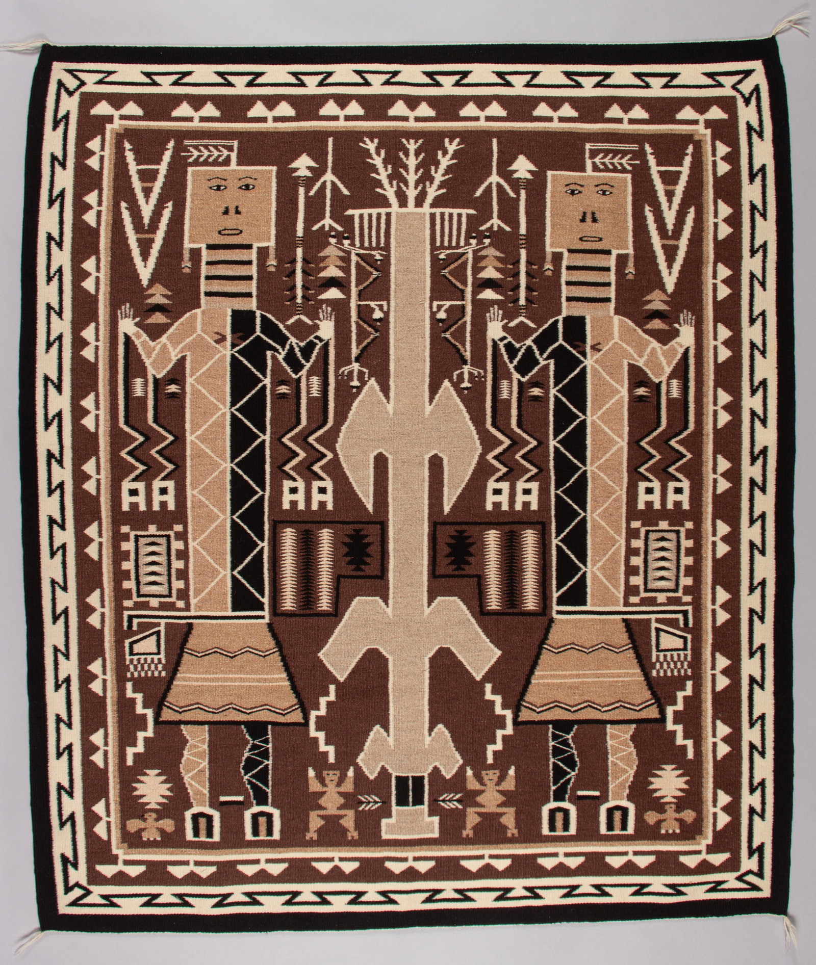 Navajo Pictoral Rug with Images of Hero Twins with Sacred Corn: Navajo pictoral rug with images of Hero Twins: Monster Slayer & Born of Water (Sons of Changing Woman); Handspun wool in natural colors woven by Julia Pete of White Rock, NM; 71 x 60"