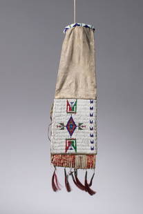 A Plains Beaded Pipe Bag, probably Lakota: Soft, natural-hide body with a beaded collar, the square lower panel stitched on a white ground, featuring a central blue-outlined diamond flanked by stepped tipis and small floral elements, quill-wra