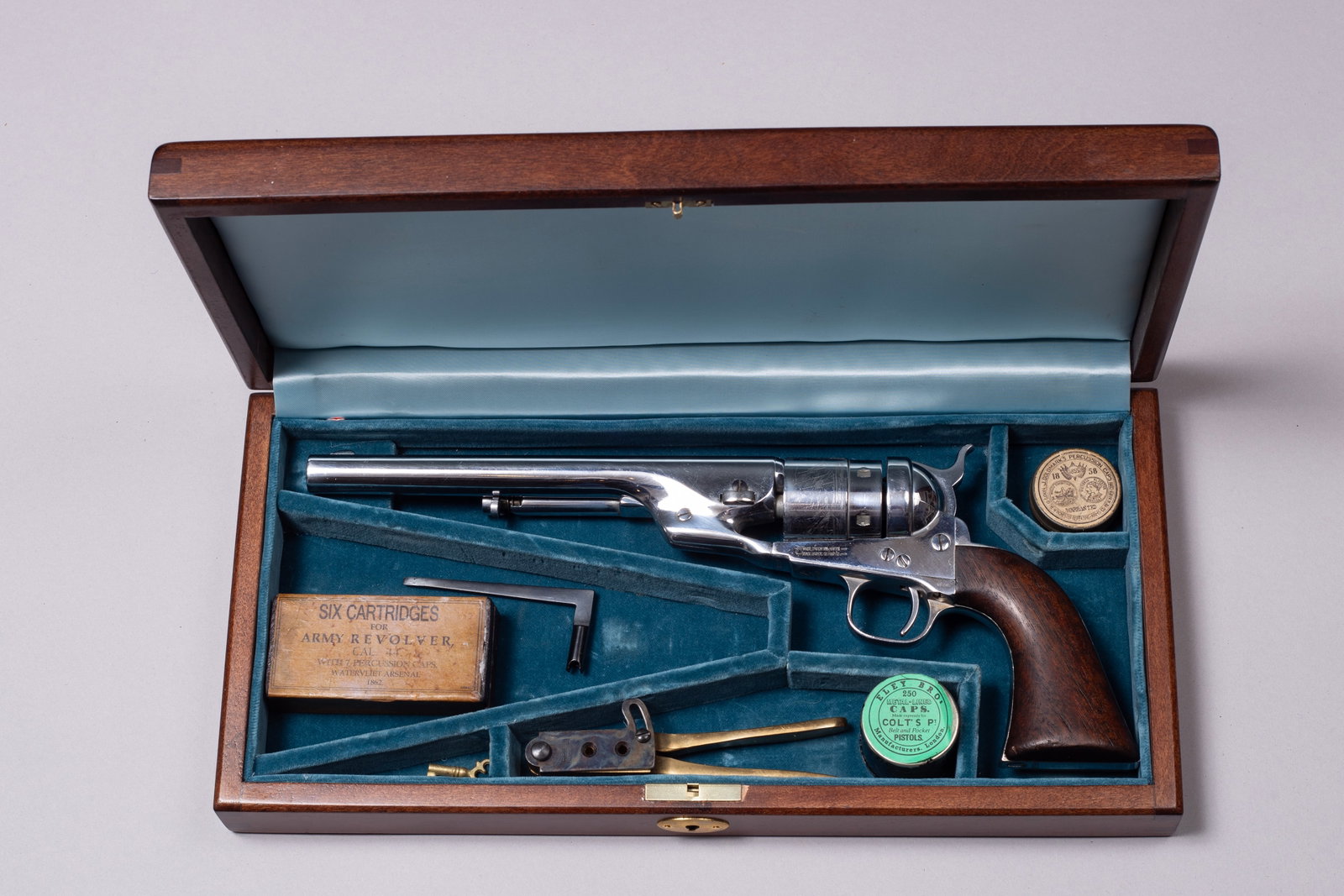Colt Army Model 1860 2nd Model Richard's Conversion: Colt Richard's "Second Model" Conversion Model 1860 Army in .44 caliber with an excellent old re-Nickel finish. The barrel is 7 1/2" with a crisp Taxal Naval scene on the cylinder. There is a faint dr