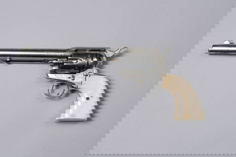 Colt SAA Revolver with Nickel Finish and Ivory Grips: Desirable antique Black Powder, Colt SAA .45 caliber revolver with antique Steerhead ivory grips and a Colt Factory letter. 7 1/2" Barrel marked "Colt's PT. F.A MFG. Co. Hartford CT U.S.A." and SN 132