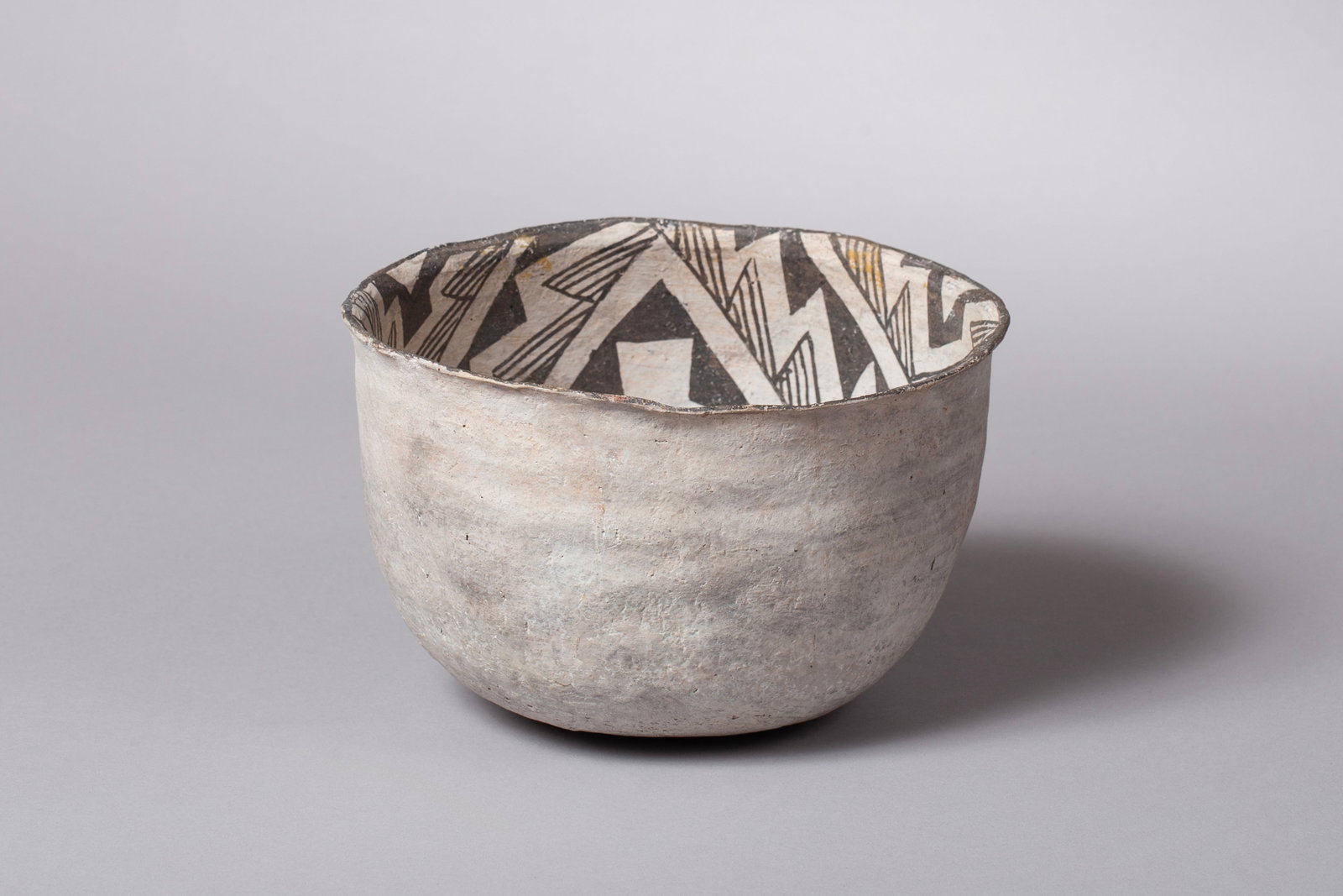 Exceptional Snow Flake Bowl, Ca 1175 - 1325 AD: Beautiful Snowflake Bowl 7 1/4"D, 5 3/4"H Minor restoration, regluing with infill and light in-painting. Provenance: Major & Nan Spessard Collection