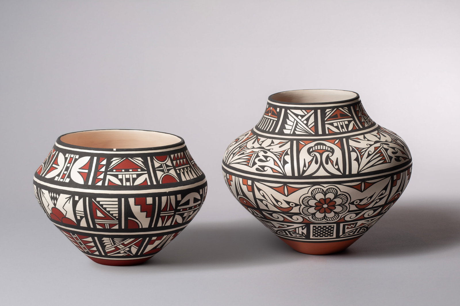 Two San Felipe Pots by Joseph and Nona Latoma: Two San Felipe Pots: A) Joseph & Nona Latoma, S.F.P. NM, 1-3-11, corn 10"D, 7 3/4"H B)Joseph & Nona Latoma, San Felipe Pueblo N.M. 3/25/09 corn 11 1/2"D, 10"H