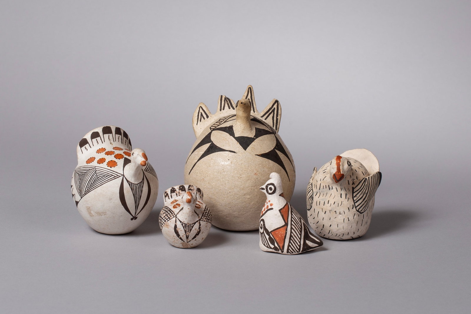 Fun Group of Five Various Acoma Birds of Various Dates: Group of Five Acoma Fowl: A) Turkey 4"D, 5"H B) Turkey 3 3/4"L, 3"W, 4"H C) Turkey 3 1/2"L, 2 3/4"W, 3"H D) Turkey 2 1/4"L, 1 3/4"W, 2 1/4"H E) Quail 2 1/4"L, 1 1/2"W, 3"H Provenance: Major & Nan Spes