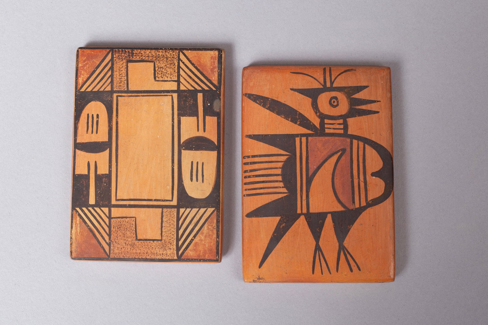 Vintage Group of Two Hopi Tiles by Sadie Adams (Hopi-Tewa, 1905 - 1995): A group of two pottery tiles created by renowned Hopi-Tewa potter Sadie Adams, known for her intricate and symbolic designs. Each tile is signed on the verso with the artist's distinctive flower hallm