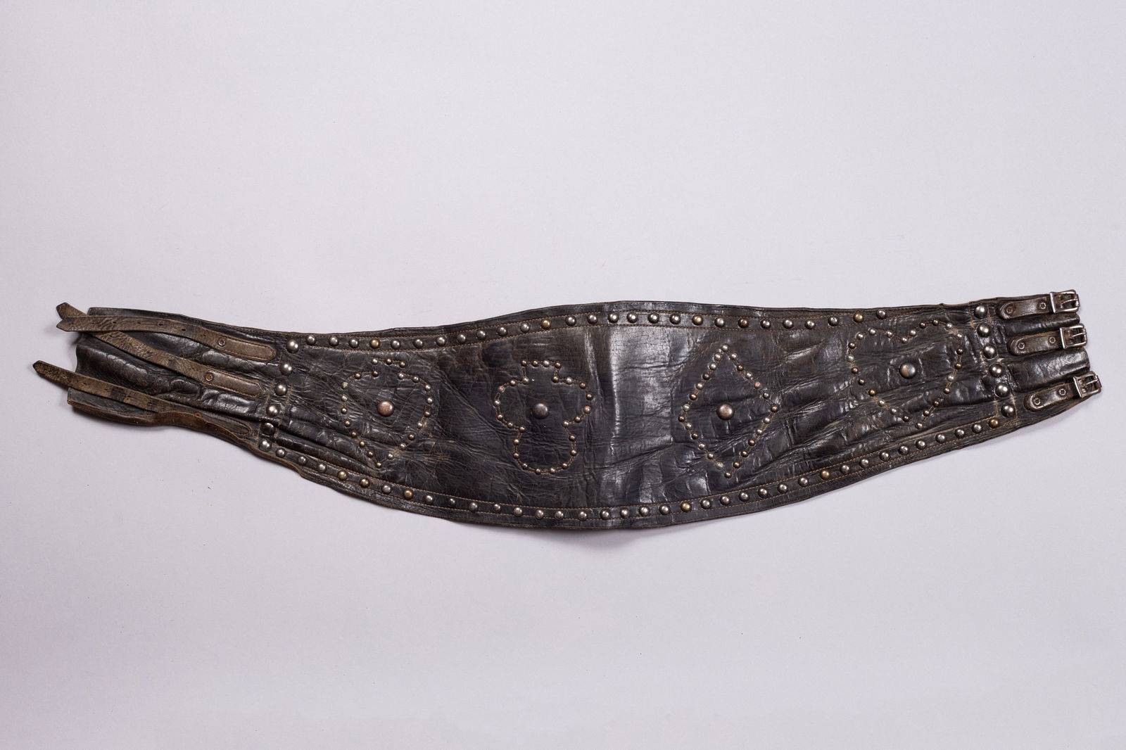 Vintage Studded Western Bronc Riding Belt with Card Suit Design: This is a striking, original vintage studded bronc riding belt, featuring the classic card suit design of spades, clubs, hearts, and diamonds. These unique, wide belts were originally worn by rodeo ro