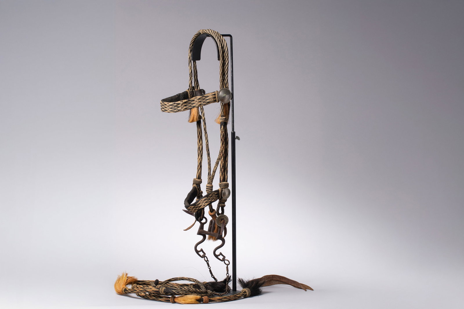 Rare Deer Lodge Prison Hitched Horsehair Bridle with Original Prison Bit: This is a stunning and highly collectible work of Western folk art, meticulously crafted by an inmate at the historic Montana State Prison in Deer Lodge. The bridle features the intricate and time-con