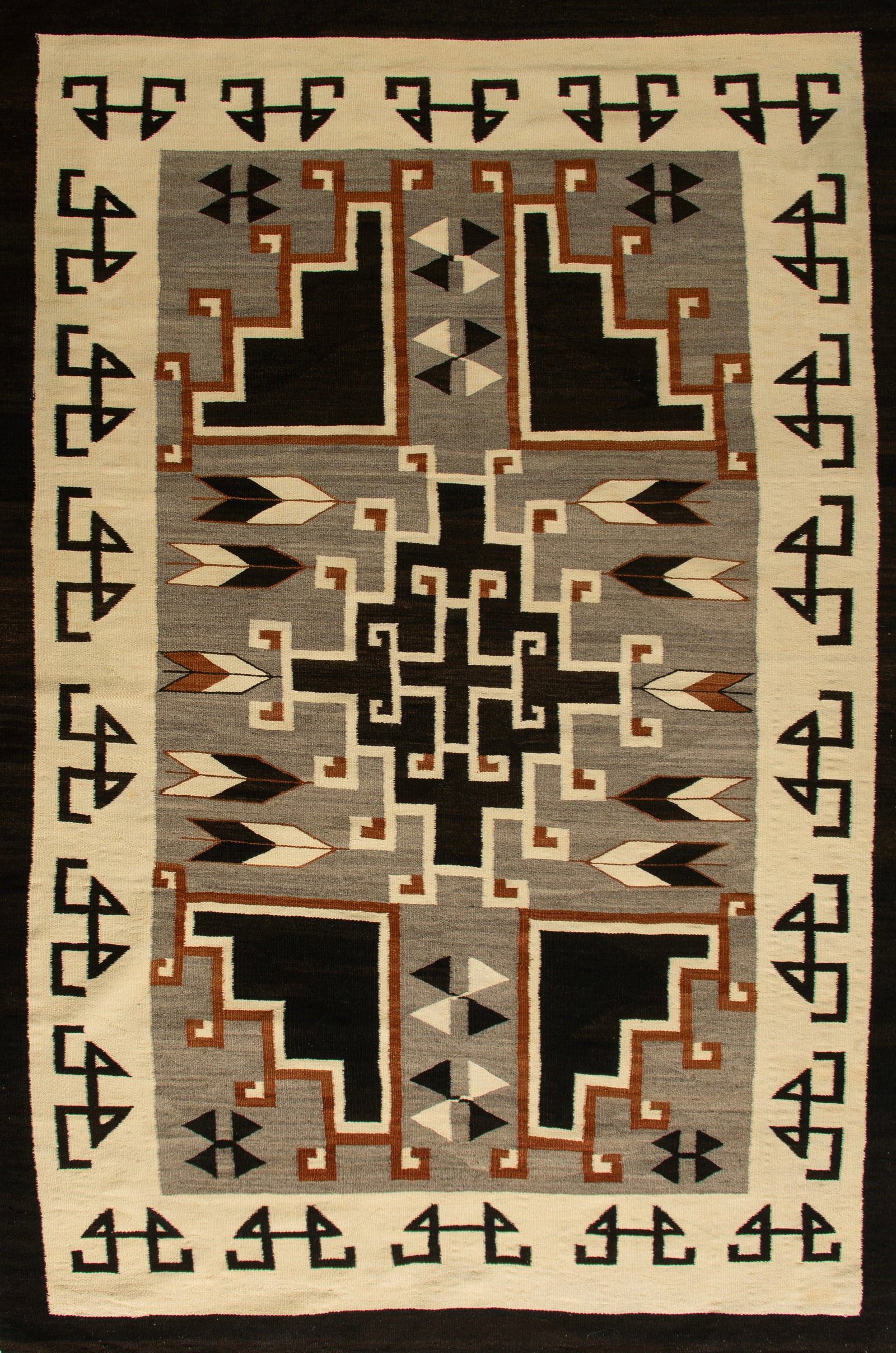 Navajo Rug Two Grey Hills, Ca 1930s: A very nice Two Grey Hills weaving handwoven from all native handspun wools, both weft and warp. Classy design with a central stepped and hooked diamond with quarter diamond elements reaching into eac