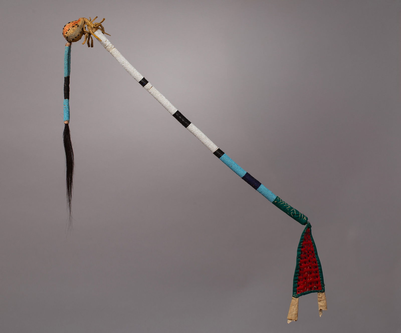 Native American Beaded Medicine Stick: Fully beaded medicine stick. Native American medicine sticks were used for various spiritual and ceremonial purposes, including prayer, healing, dance and to grant the holder the right to speak withou