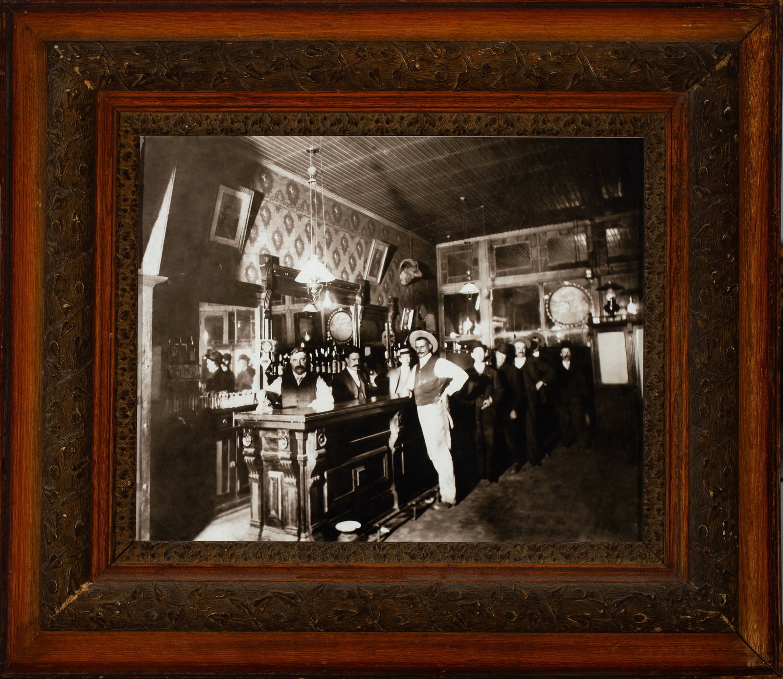 Old West Saloon Photo Nicely Framed: Well framed reproduced photo of an old western saloon. 26 1/4"h x 30 1/2"w