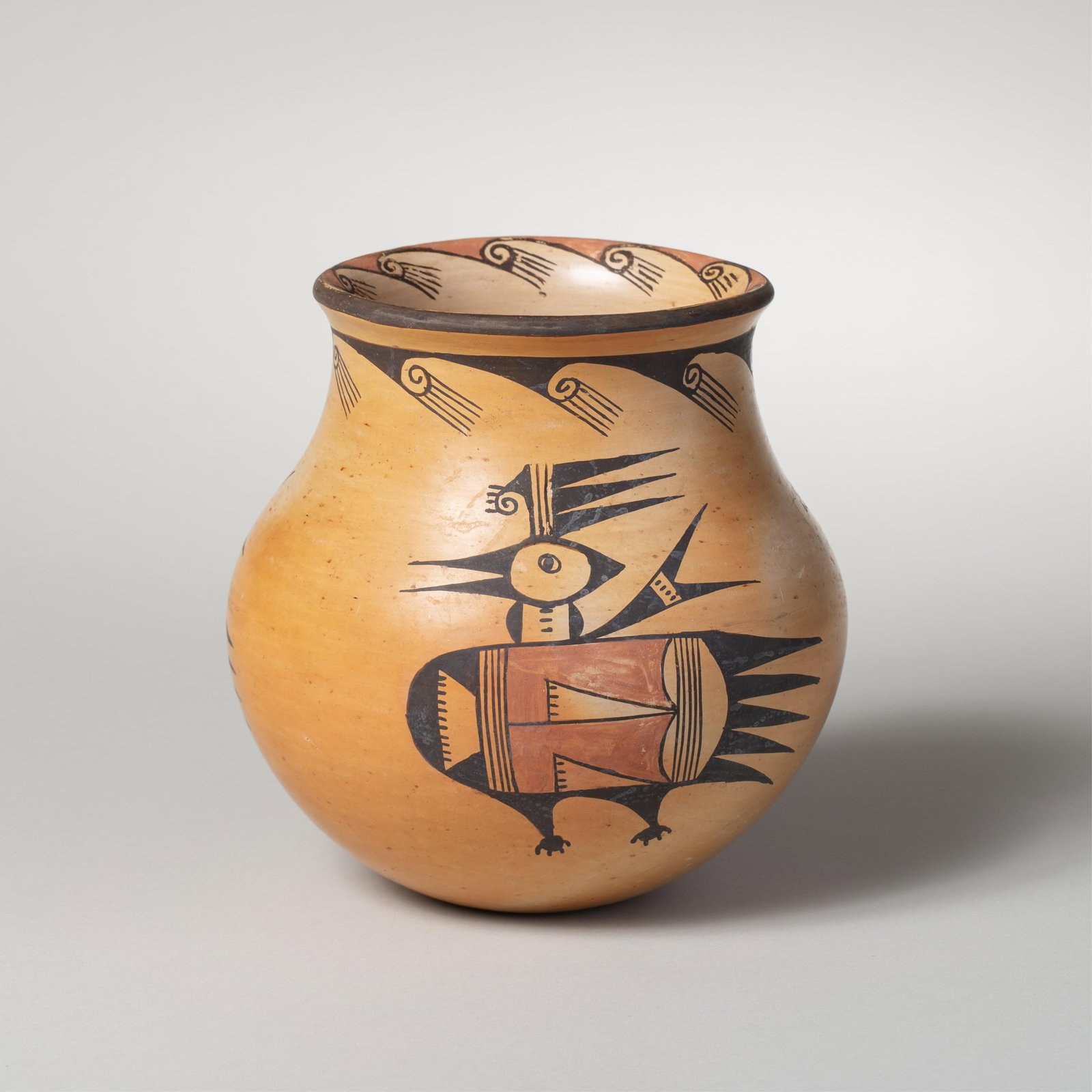 Emily Komalestewa, Hopi Avian Pot: Pottery jar of traditional form and design, decorated in black and orange over a classic Hopi bright orange ground with stylized bird and geometric motifs. The design features traditional