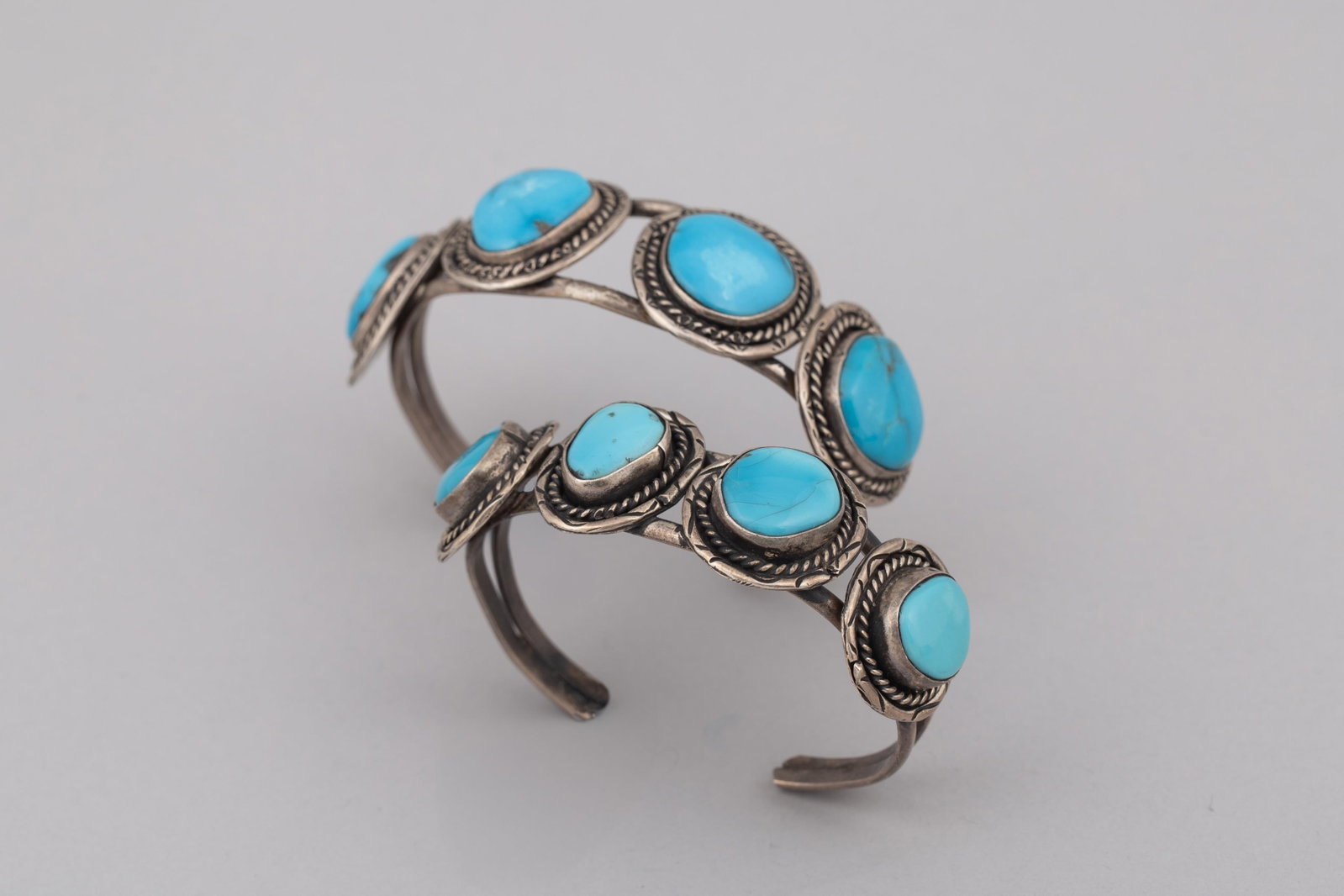 Two Vintage Navajo Turquoise Bracelets, each with Four Stones (1 of 8)