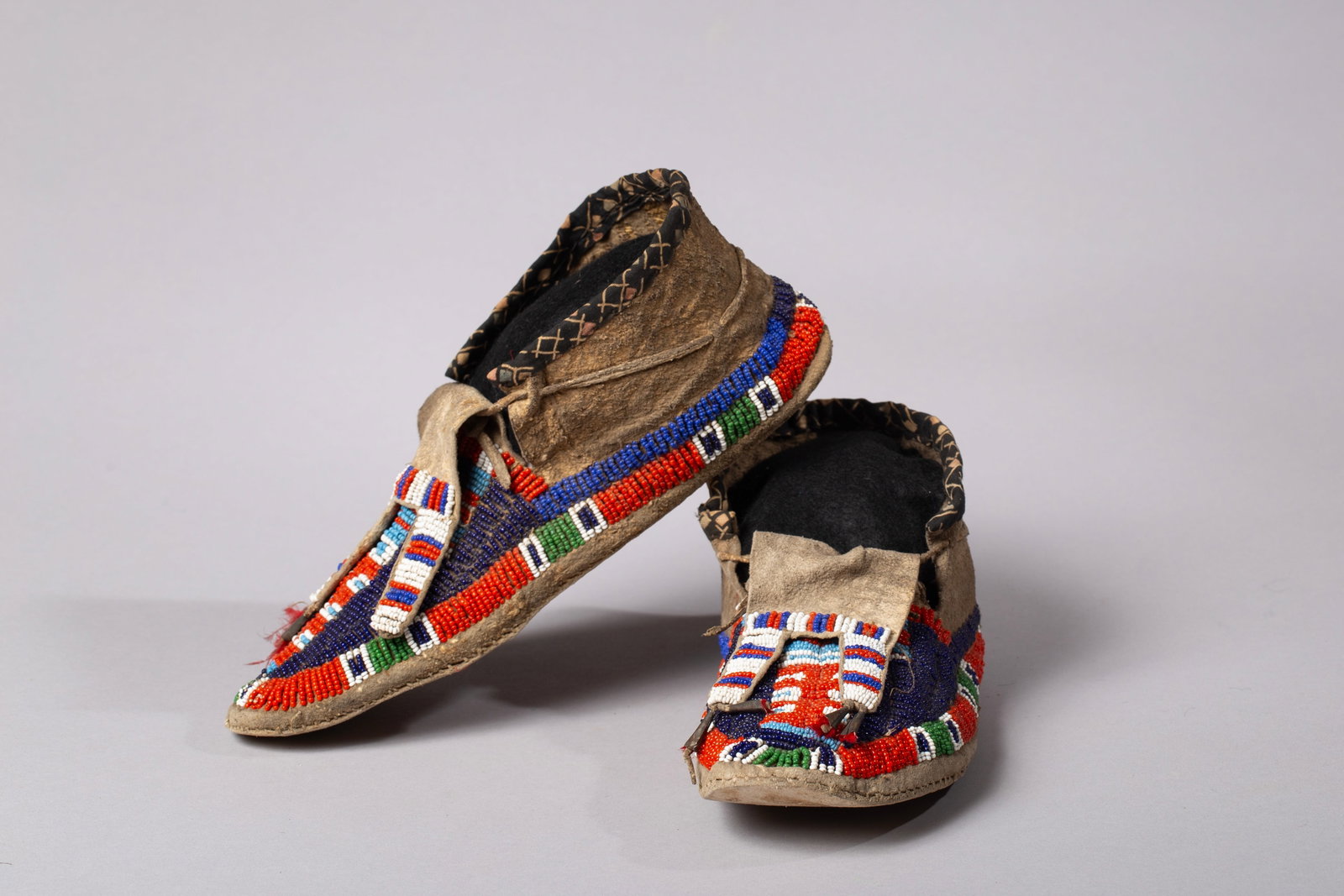 A Fine Pair of Northern Plains Beaded Hide Moccasins, Likely Lakota (Sioux) (1 of 6)