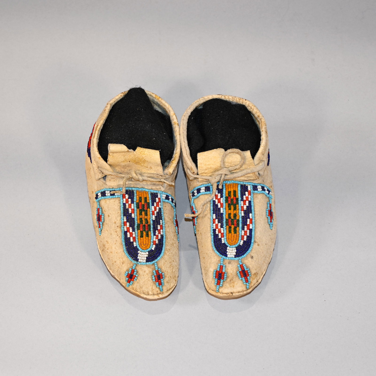 Pair of Blackfoot Children's Beaded Hide Moccasins (1 of 4)
