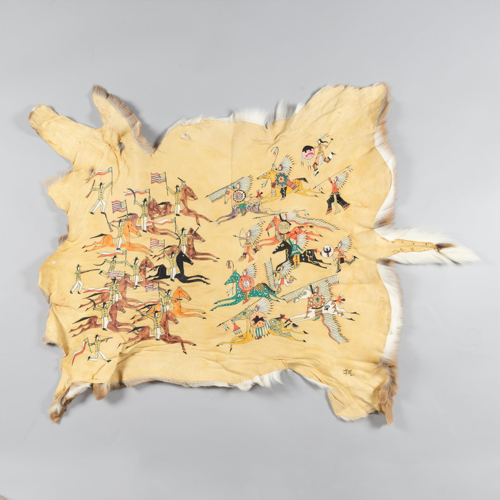 Plains Indian Wars Painted Deer Hide, 2002: A finely executed pictorial hide painting, likely of Lakota or Shoshone origin, depicting a dynamic battle scene. The composition features multiple equestrian warriors engaged in conflict, rendered in