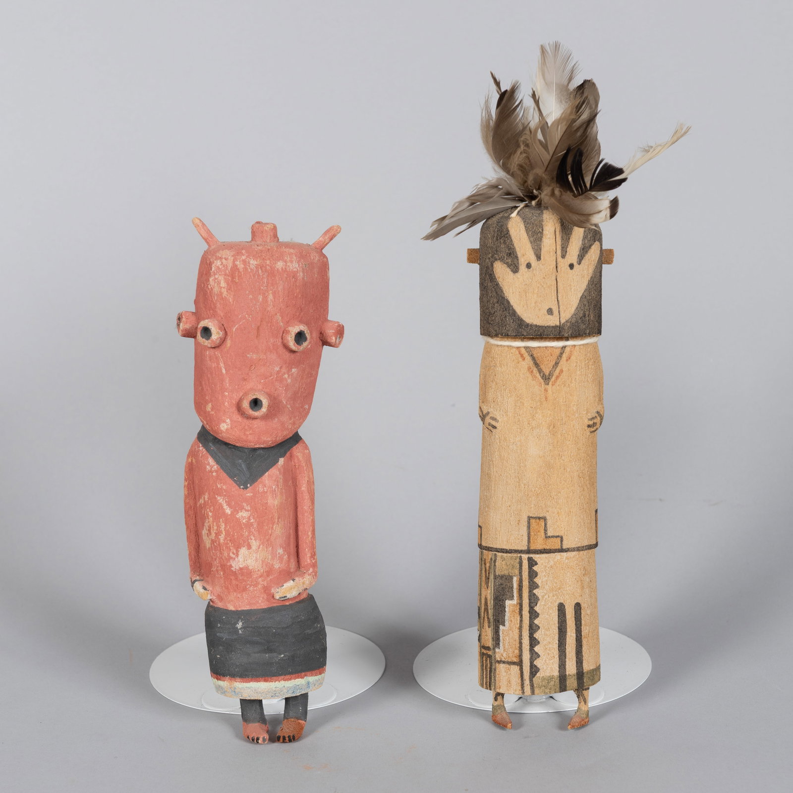 Hopi Hand-Carved Cottonwood Mudhead and Pot Carrier Katsina: This vintage Katsina doll features the iconic Koyemsi, or Mudhead, the most recognized of all Hopi katsinam. Distinguished by its oversized, knobbed mask and reddish-brown "mud" body pigment, the Mudh