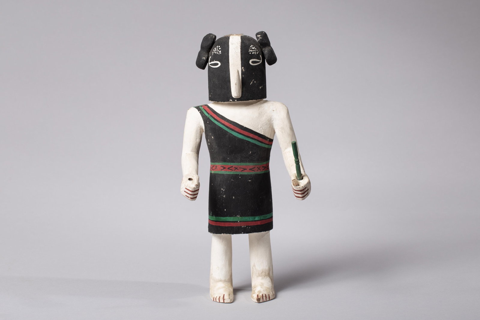 Vintage Hopi Carved Cottonwood Kokopölmana (Kokopelli Mana) Katsina Doll: A vintage Hopi Pueblo hand-carved cottonwood root Katsina doll depicting Kokopölmana (the Kokopelli Mana or Humpbacked Flute Player Maiden). This figure is sculpted in a classic, early-to-mid 20th-ce