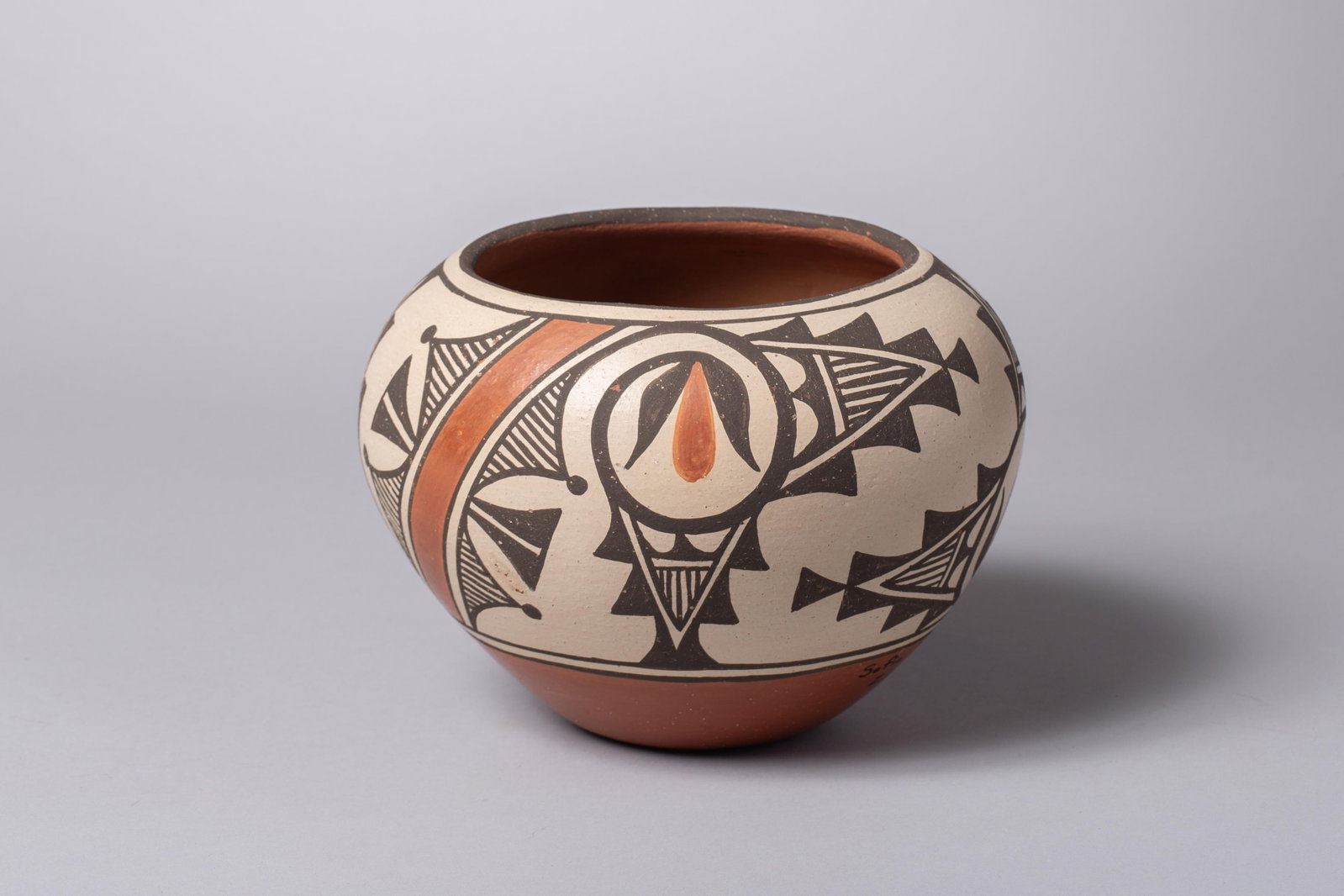 Sofia Medina, Zia Pueblo 1932-2010, Zia Pueblo Polychrome Pottery Bowl: An exceptional vintage Native American hand-coiled and hand-painted polychrome clay pottery bowl by award-winning Zia Pueblo artist Sofia Medina. This highly collectable piece showcases traditional So