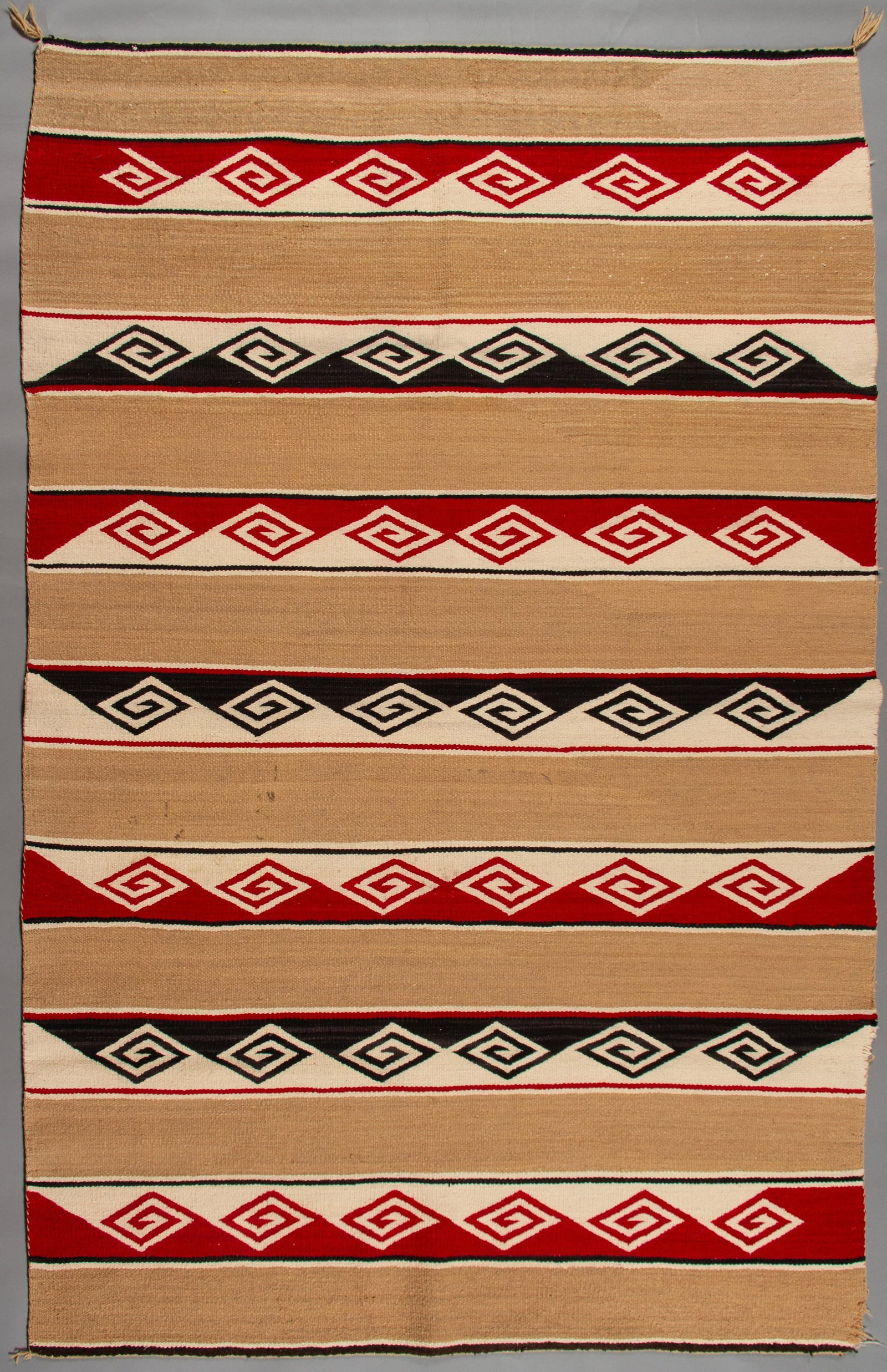 Vintage Navajo Chinle Revival Weaving, Ca 1960s: A superb example of mid-century Navajo craftsmanship, this robust and tightly woven rug exhibits the classic characteristics of the Chinle Revival style. Navajo robust, tight, and firm blanket or rug.