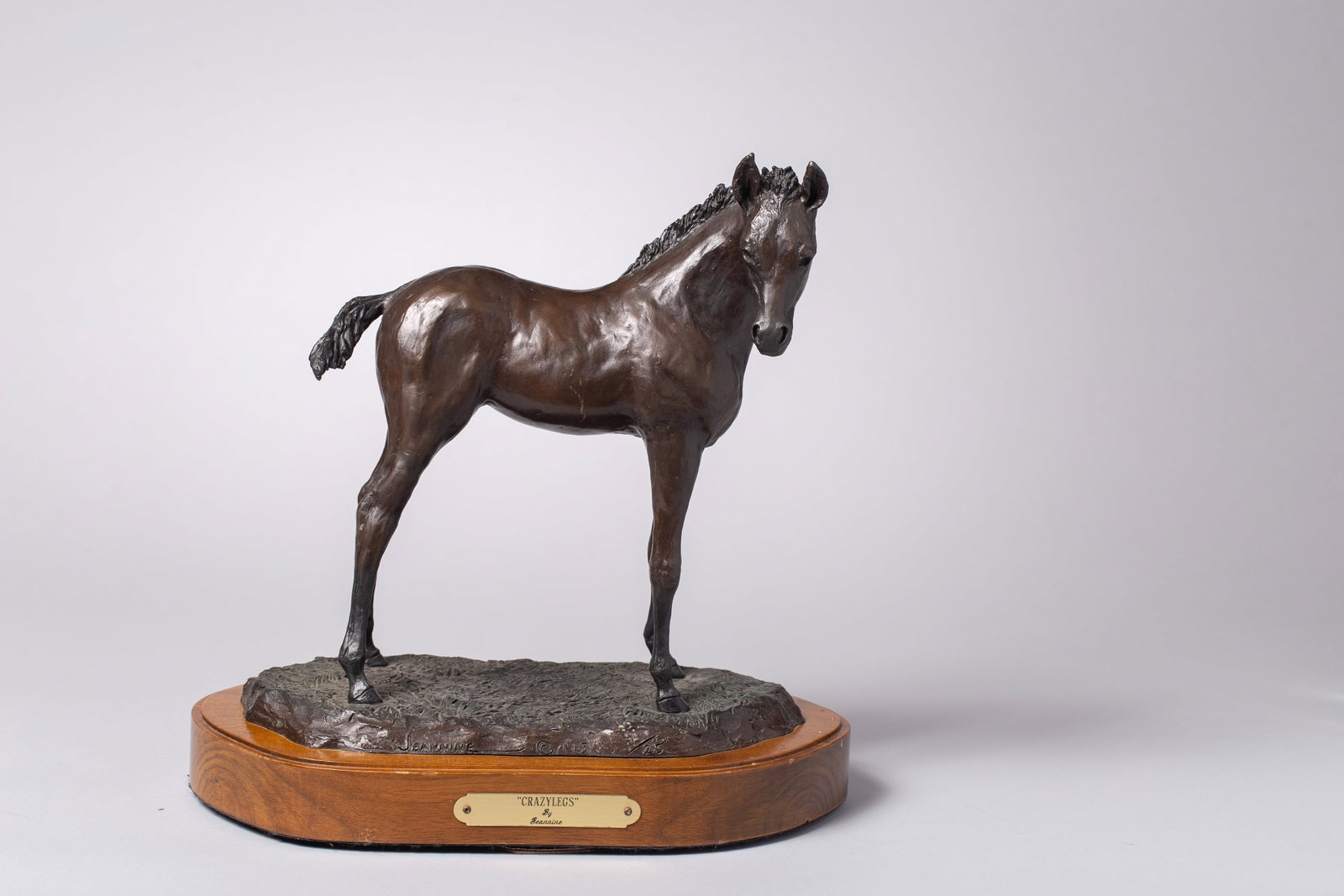 Jeannine Young (b. 1952), Crazylegs, Bronze: Foals are naturally awkward, with long, gangly legs that seem out of proportion to their small bodies. By naming the piece "Crazylegs," Young perfectly captures that endearingly clumsy, energetic stag