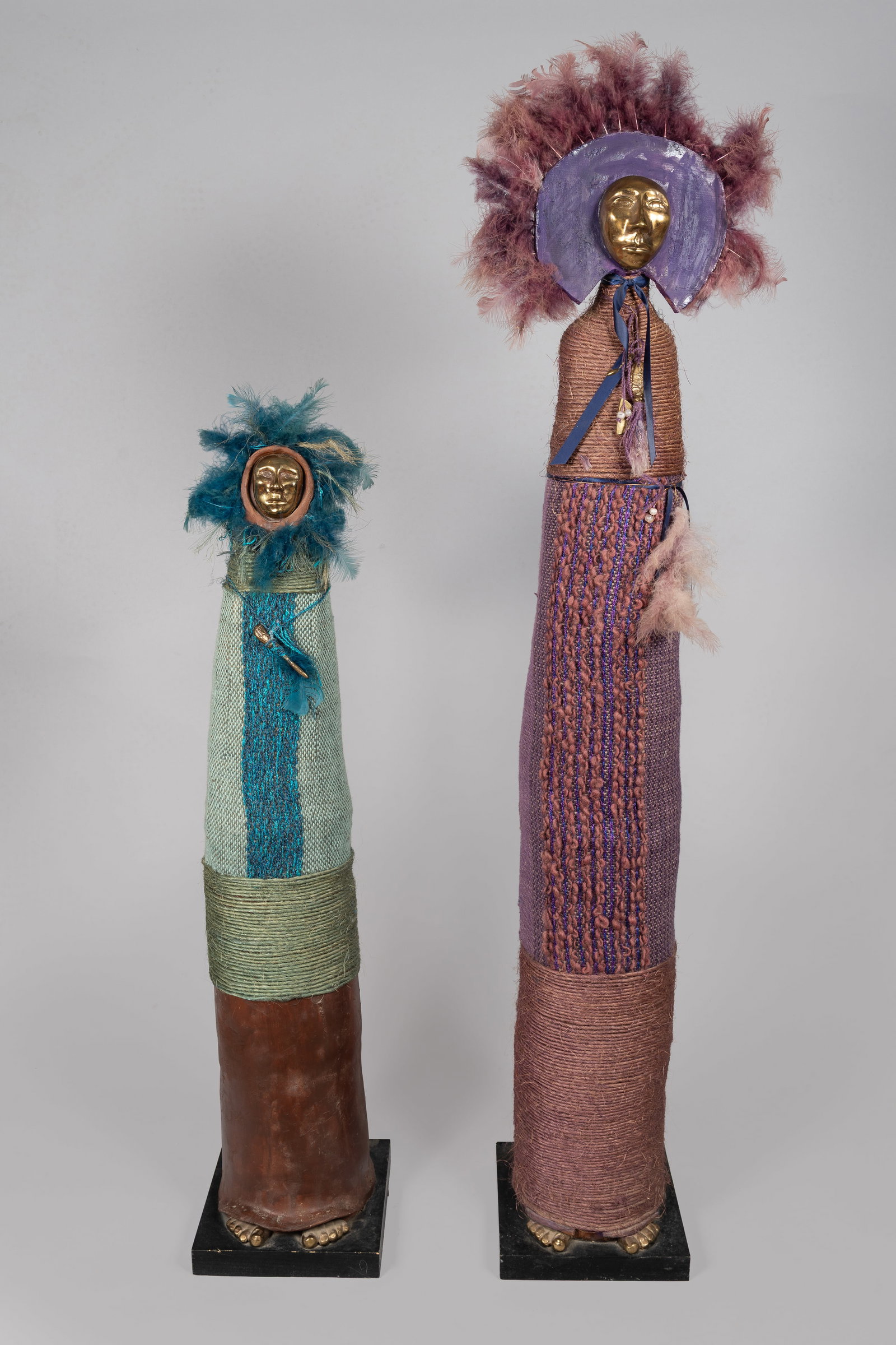 Naida Seibel (1933-2026), Mixed Media Figurative Sculptures, c. 1986: A highly stylized pair of mixed media figurative sculptures by noted Fort Collins and Santa Fe artist Naida Seibel. Created at the height of her mid-1980s studio practice, these distinct standing figu
