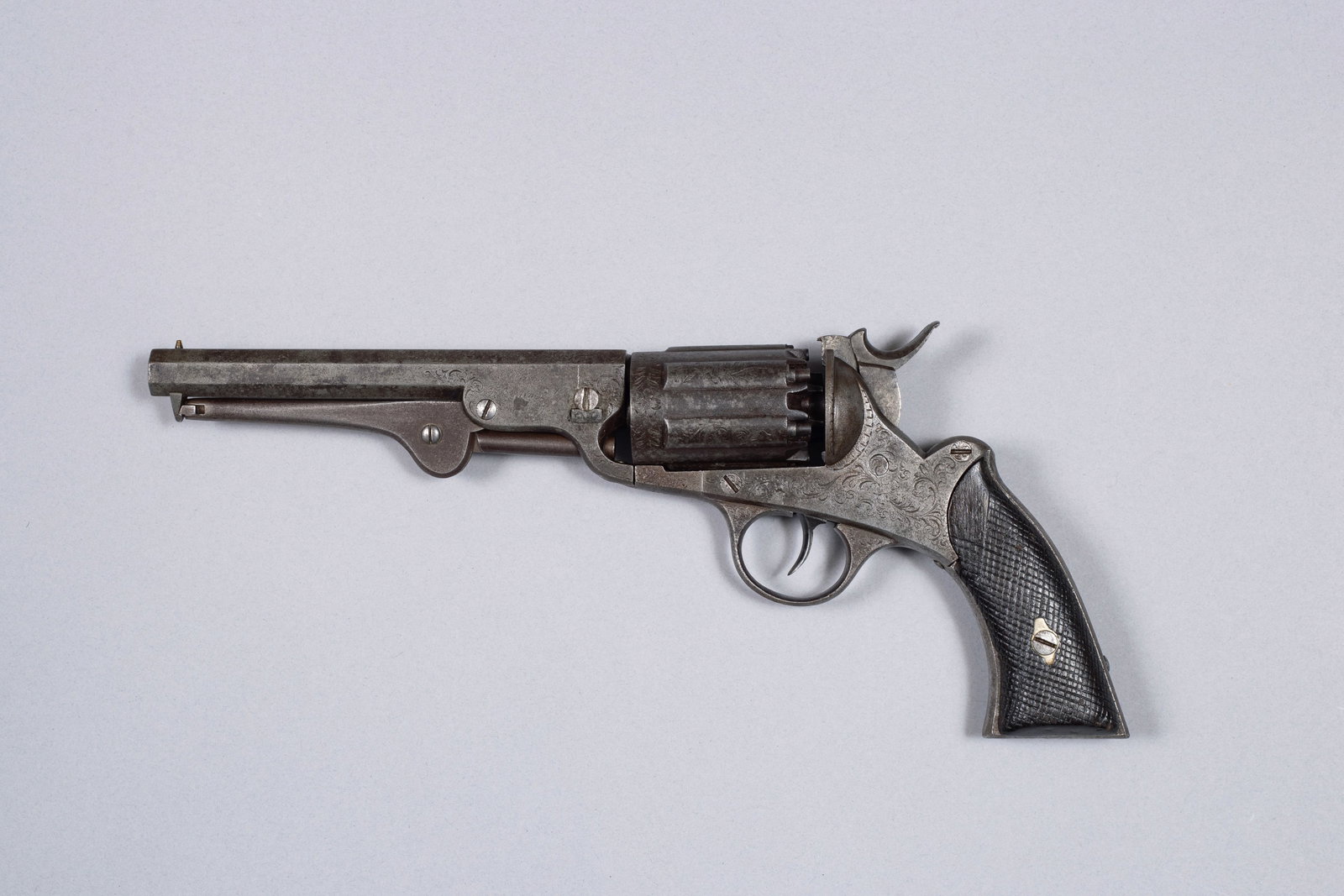 Rare Walch Civil War Era 12-Shot Factory Engraved Revolver, SN 2: Rare Walch CW era 12-shot Walch factory engraved revolver, SN 2Patented by John Walch in 1859, this 36 caliber revolver using superimposed chambers on 12-nipple cylinder–each chamber holding two sho