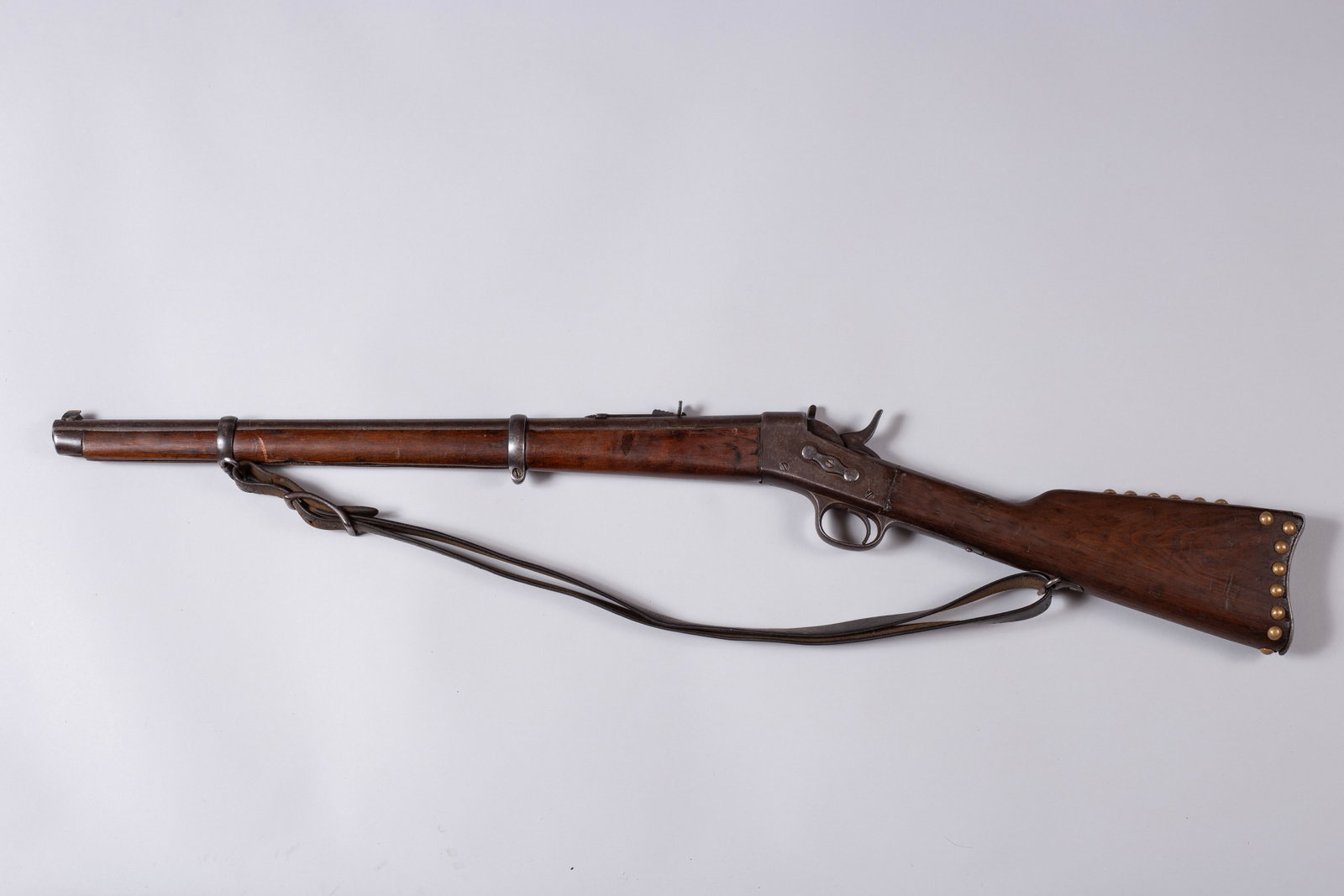 Native American Tac Springfield 45-70: An iconic firearm of the late 19th-century American frontier, this antique single-shot, breech-loading U.S. Springfield Trapdoor rifle is chambered in the powerful .45-70 Government caliber. A histori
