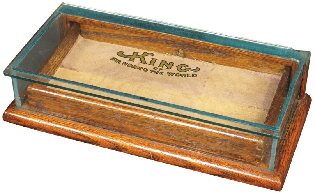 King Collar Button Store Display Case: King Collar Button Store Display Case. Original decal. Chips at top/bottom right corners otherwise very good condition. 9 1/2 X 2 1/4 X 4 1/2 inches.