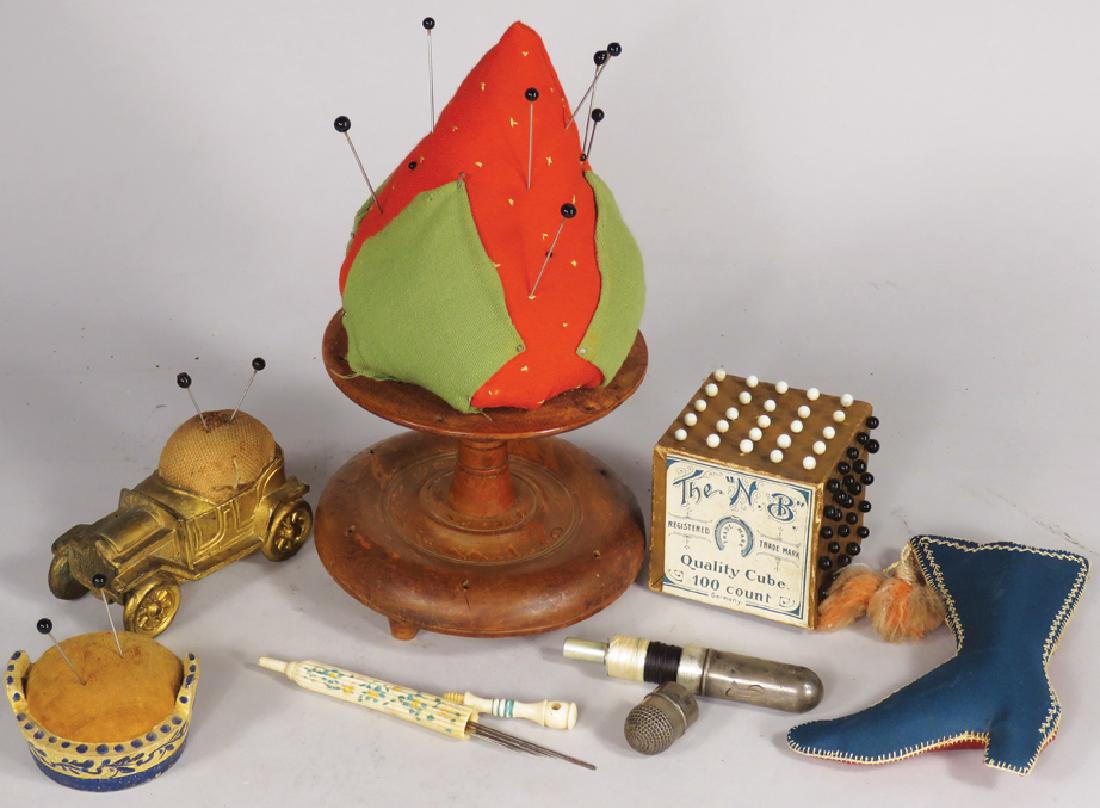 Collection of Early Sewing Items: Collection of Early Sewing Items. Pin cube, 3 figural pin cushions (sedan, bucket and shoe), umbrella figural vegetable ivory needle case and silver plate sewing kit comes with needle, thread and thim