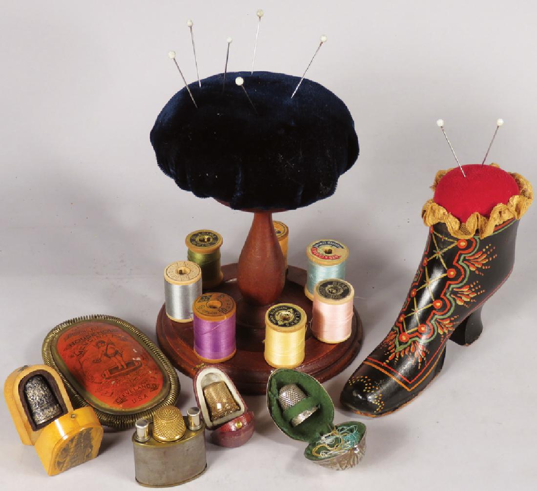 Collection of Early Sewing Items: Collection of Early Sewing Items. Sewing reel made by Sabbath Day Lake Shakers, 3 thimble cases (walnut, leather and souvenir Blue Ridge Springs, VA). Wood shoe figural pin cushion, miniature figural 