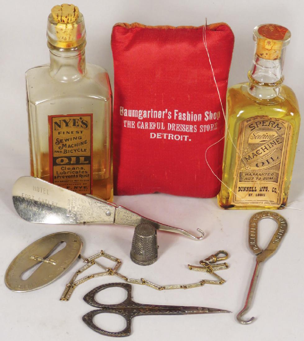 Collection of Sewing and Millinery Items: Collection of Sewing and Millinery Items. Hotel Fort Shelby and R.H. Fyfes & Co. button hooks. Kettberry Scissor sharpener, scissors, thimble with side cutting blade. Nye's and Sperm Sewing Machine Oi