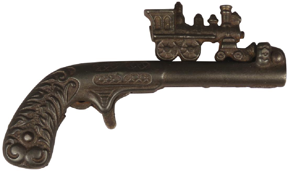 Cast Iron Cap Gun, Lightning Express: Cast Iron Cap Gun, Lightning Express, Mfg. by Kenton. Trigger releases locomotive to shoot, ca. 1880. 5 inches long.