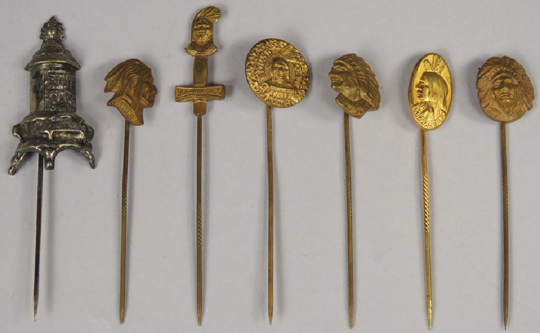 Collection of Round Oak Stoves Stick Pins: Collection of Round Oak Stoves Stick Pins. 7 total pieces, tallest measures 3 inches.