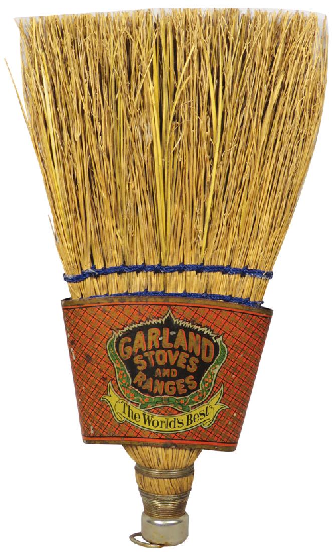 Garland Stoves and Ranges Tin Litho Holder: Garland Stoves and Ranges Advertising Tin Litho Wall Mount Whisk Broom Holder. Scratches otherwise good original condition. Holder measures 4 1/2 X 4 1/2 X 1 1/2 inches.