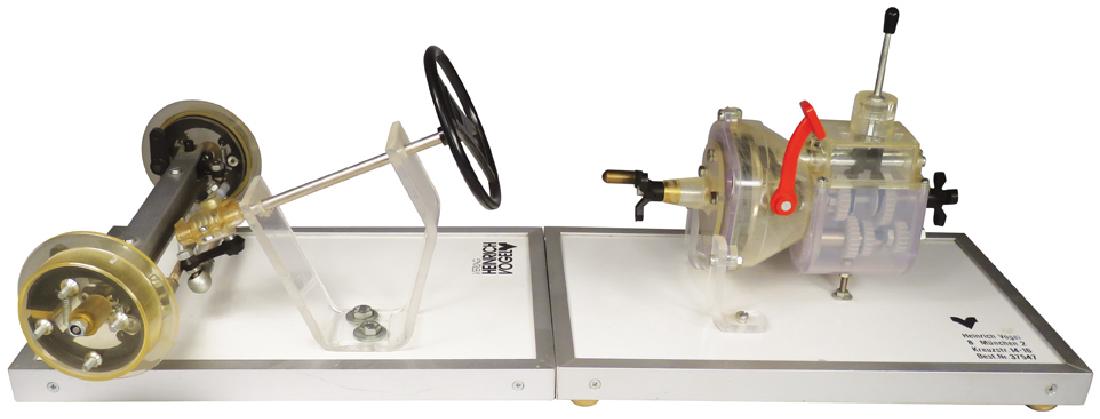 German School Training Models: German School Training Models. 2 pieces include Henrich Vogel steering and transmission. Overall 22 1/2 inches lonG
