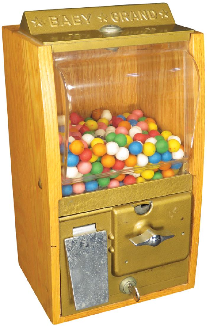1939 Baby Grand "Gumball" Gambling Machine: 1939 Baby Grand "Gumball" Gambling MachinE Disguised to look like gumball machine is really a gambling devicE Hidden among the gumballs are balls containing a ticket with slot machine symbols to win m