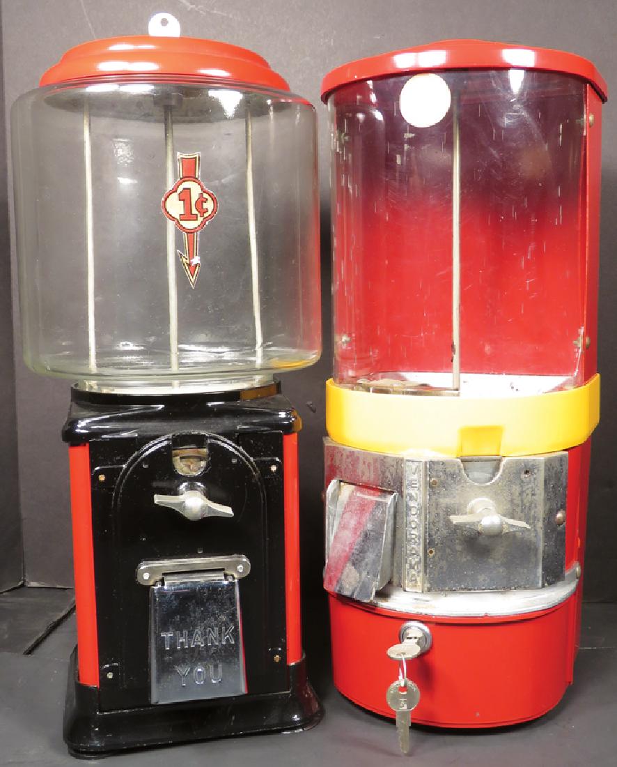 Two Peanut Vendors: Two Peanut Vendors. Victor Vendorama bulk vending machinE Black and red one cent machinE Both in good working condition, come with keys. 17 3/4 inches tall.