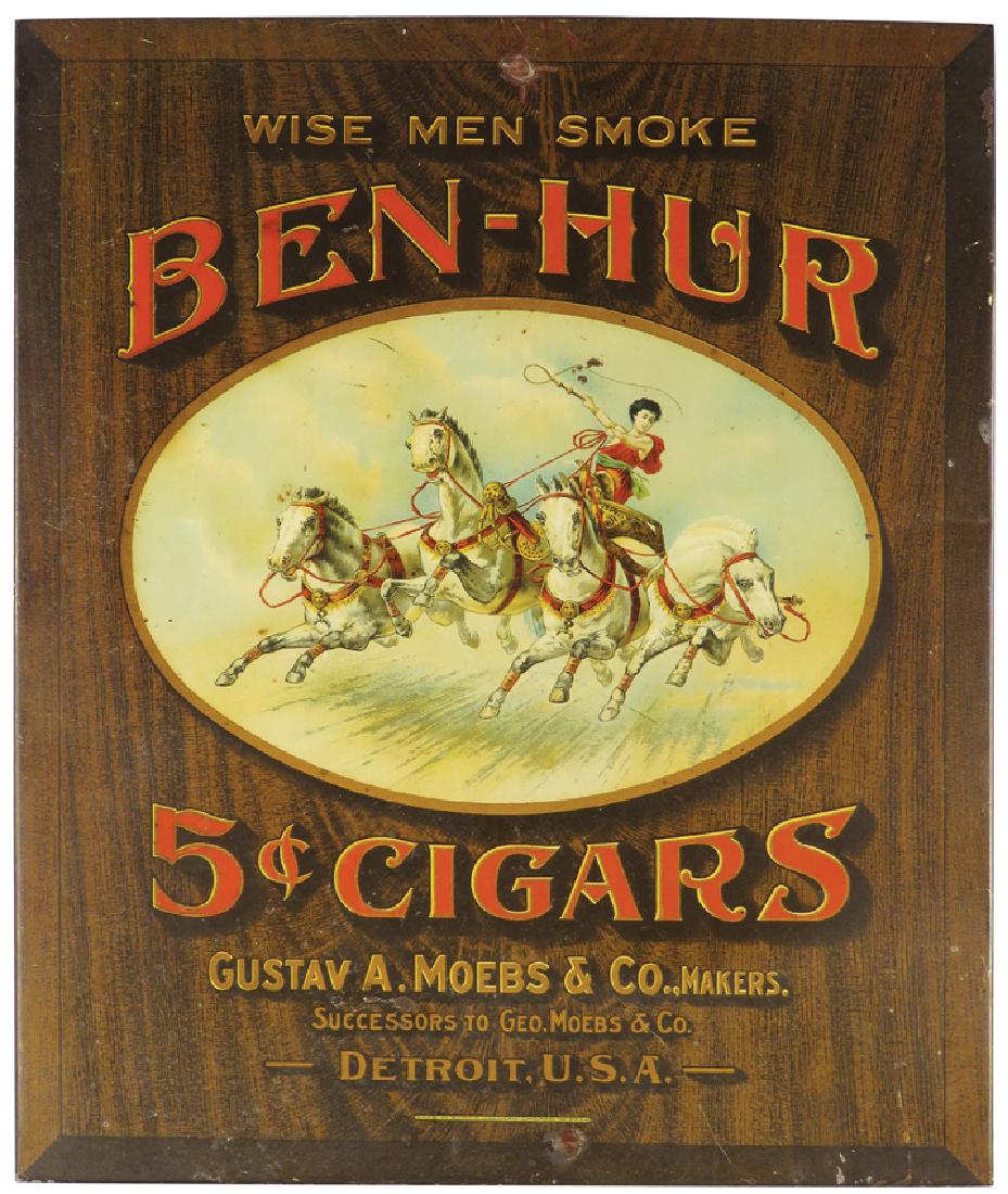 Ben-Hur Cigars Tin Over Cardboard Sign: Ben-Hur Cigars Tin Over Cardboard String Hanging Sign. Gustav A Moebs & Co. Makers, Detroit. Nail holes at top and bottom otherwise good condition. 10 1/4 X 12 inches.