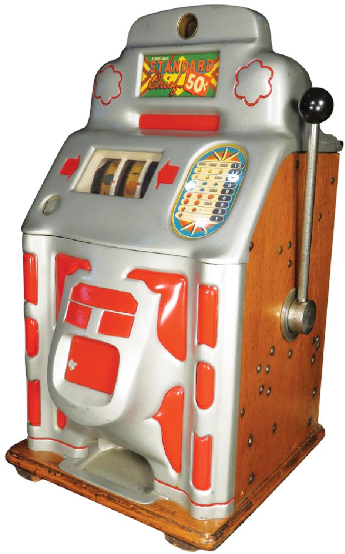 Jennings 50 Cent Standard Chief Slot Machine: Jennings 50 Cent Standard Chief Slot MachinE Original working condition. Floating lock, no key.