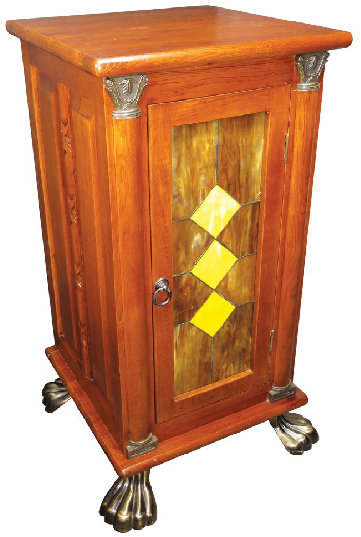 Contemporary Slot Machine Oak Cabinet: Contemporary Slot Machine Oak Cabinet with mahogany stain. Amber and yellow diamond leaded slag glass front with claw feet. 17 X 33 X 17 inches.