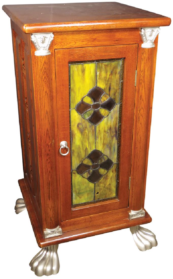 Contemporary Slot Machine Oak Cabinet: Contemporary Slot Machine Oak Cabinet with mahogany stain. Amber and yellow leaded slag glass front with claw feet. 17 X 33 X 17 inches.