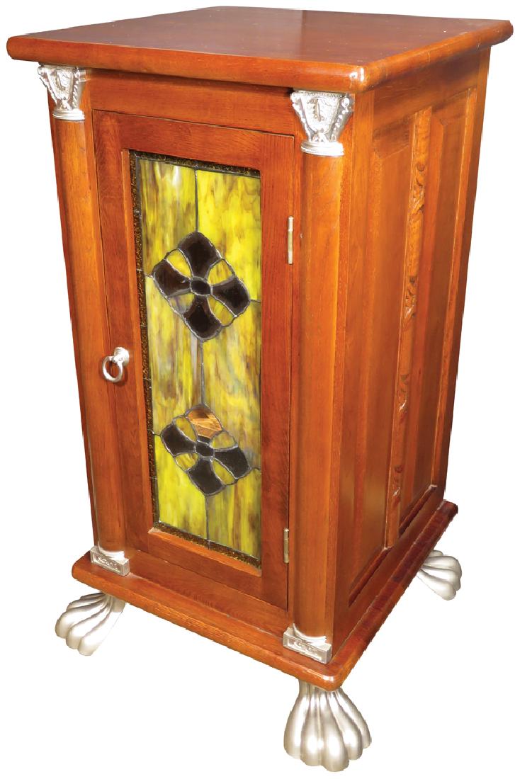 Contemporary Slot Machine Oak Cabinet: Contemporary Slot Machine Oak Cabinet with mahogany stain. Amber and yellow leaded slag glass front with claw feet. 17 X 33 X 17 inches.