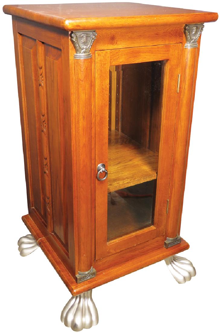 Contemporary Slot Machine Oak Cabinet: Contemporary Slot Machine Oak Cabinet with mahogany stain and clear beveled glass door and claw feet. 17 X 33 X 17.