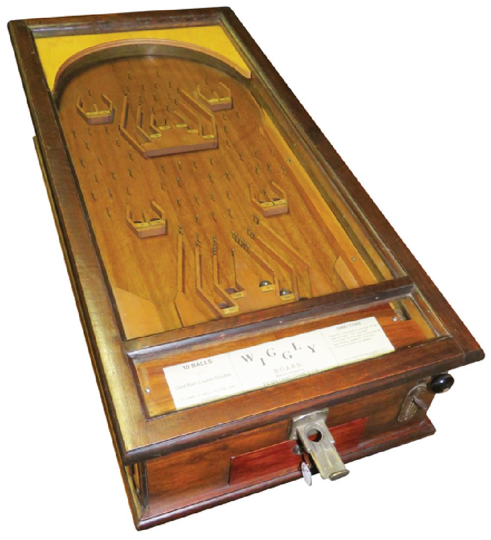 "Wiggley" Game of Skil, Action & Suspense: "Wiggley" Game of Skill, Action & SuspensE Early Counter Top Pin Ball MachinE Penn - Ohio Game Co. Sharon, PA Excellent Working Condition. 17 3/4 X 37 X 10 1/2 inches.
