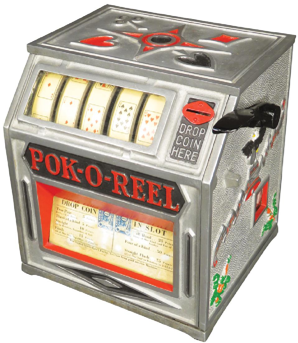 Pok-O-Reel 5 Cent Trade Stimulator: Pok-O-Reel 5 Cent Trade Stimulator. Card suit motiF Jammed original condition, no back. 9 1/2 X 10 1/2 X 8 1/2 inches.
