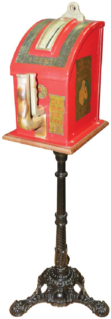 Coin Operated 1 Cent Grip Strength Tester: Coin Operated 1 Cent Grip Strength Tester. D Gottlieb & Co. Chicago makers. Original decals, very good original condition on cast iron basE Overall 43 inches tall.